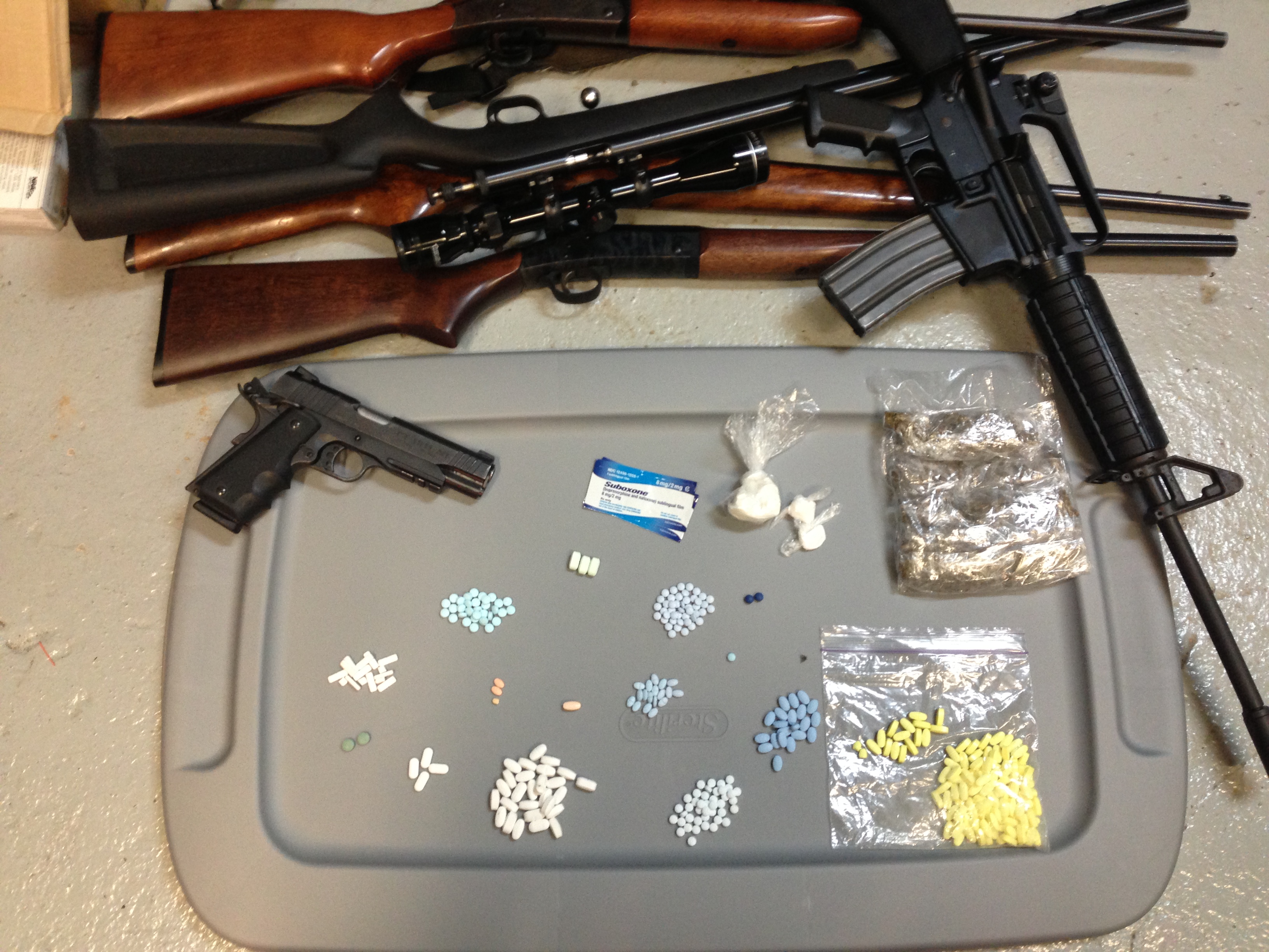 Officers Seize Drugs Guns And Cash In Raids At Home And Bar