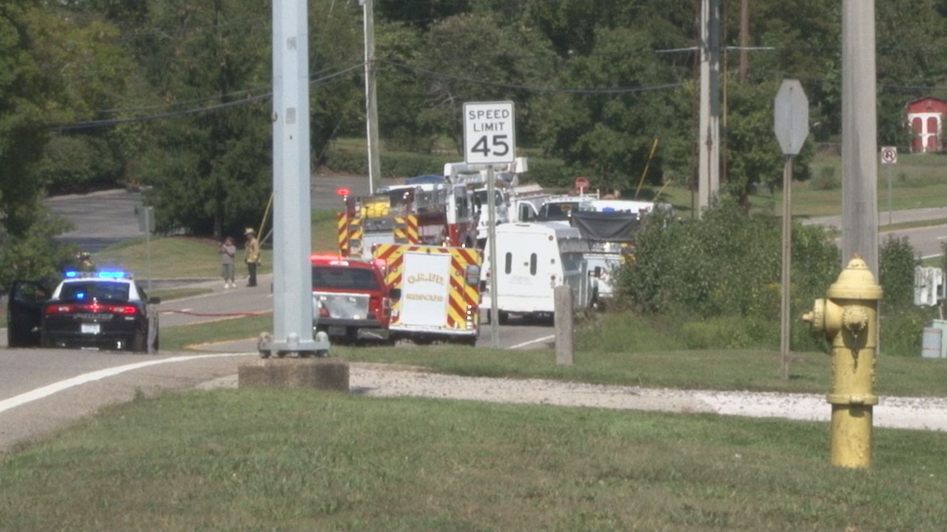 Two bystanders help rescue man from fiery car crash